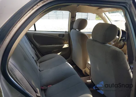 1999 Toyota Corolla Ce from USA, damaged, VIN 2T1BR12E1XC141396